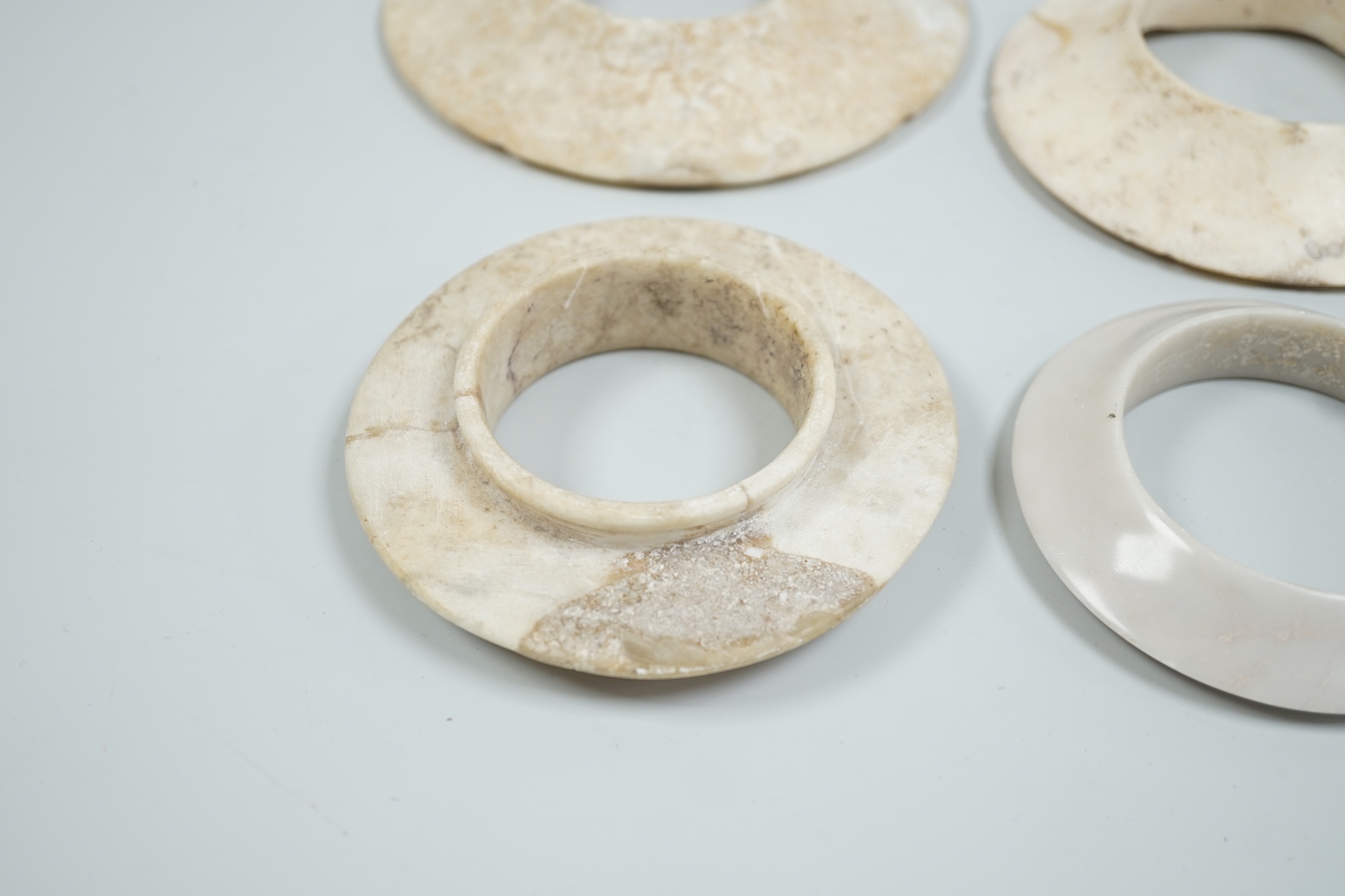 Four Indonesian marble bangles
